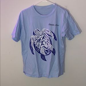 Blue t shirt. Cancun Mexico with turtle design